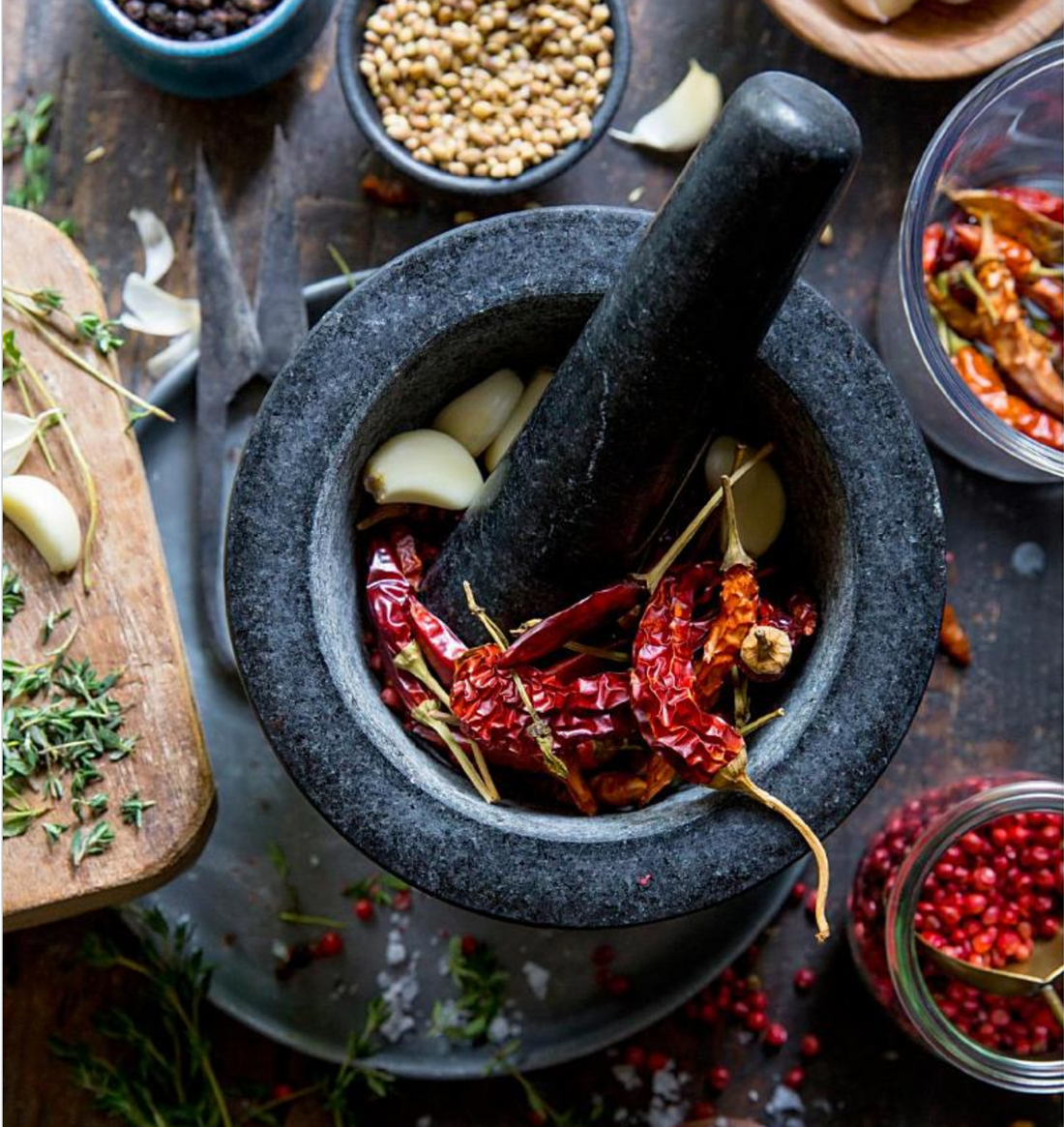 Mortar and pestle with spices used in UMAi Dry